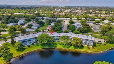 SPECTACULAR CONDO WITH AMAZING WATER VIEW FROM THE 4TH FLOOR on Hillsboro Pines Golf in Florida - for sale on GolfHomes.com, golf home, golf lot