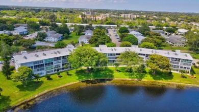 SPECTACULAR CONDO WITH AMAZING WATER VIEW FROM THE 4TH FLOOR on Hillsboro Pines Golf in Florida - for sale on GolfHomes.com, golf home, golf lot