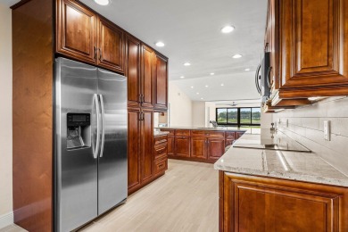 Pinnacle top-floor residence in Eastgate boasting panoramic on Hunters Run Golf and Country Club in Florida - for sale on GolfHomes.com, golf home, golf lot