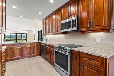 Pinnacle top-floor residence in Eastgate boasting panoramic on Hunters Run Golf and Country Club in Florida - for sale on GolfHomes.com, golf home, golf lot
