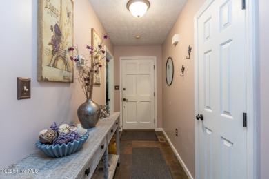 Charming home in the gated Woodlake community!  Situated on a on Woodlake Country Club in North Carolina - for sale on GolfHomes.com, golf home, golf lot