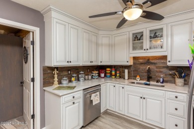 Charming home in the gated Woodlake community!  Situated on a on Woodlake Country Club in North Carolina - for sale on GolfHomes.com, golf home, golf lot