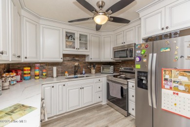 Charming home in the gated Woodlake community!  Situated on a on Woodlake Country Club in North Carolina - for sale on GolfHomes.com, golf home, golf lot