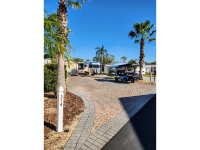 This sweet lot has it all; upgraded pavers, suitable for any on Deer Creek RV Golf Resort in Florida - for sale on GolfHomes.com, golf home, golf lot