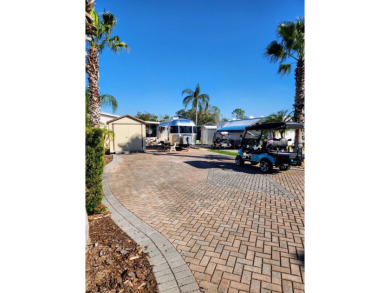 This sweet lot has it all; upgraded pavers, suitable for any on Deer Creek RV Golf Resort in Florida - for sale on GolfHomes.com, golf home, golf lot