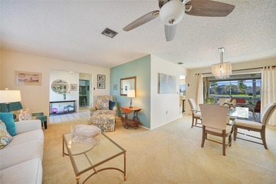 Situated on a desirable oversized corner lot with a on Twin Isles Country Club in Florida - for sale on GolfHomes.com, golf home, golf lot