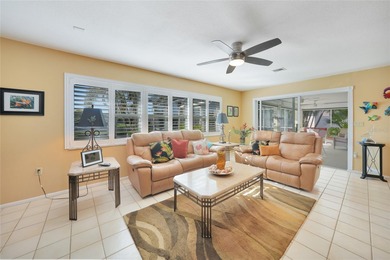 Situated on a desirable oversized corner lot with a on Twin Isles Country Club in Florida - for sale on GolfHomes.com, golf home, golf lot