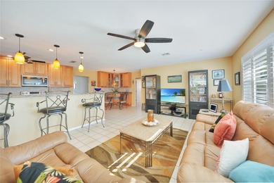 Situated on a desirable oversized corner lot with a on Twin Isles Country Club in Florida - for sale on GolfHomes.com, golf home, golf lot