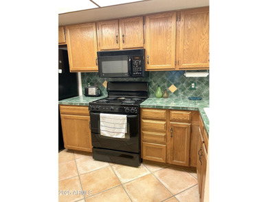 Resort-style living with beautiful mountain and golf course on Ahwatukee Country Club in Arizona - for sale on GolfHomes.com, golf home, golf lot