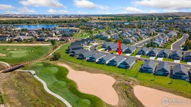 Experience luxury and low-maintenance living in this exquisite on Pelican Lakes Golf and Country Club in Colorado - for sale on GolfHomes.com, golf home, golf lot