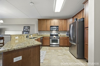 Well-maintained 7th-floor unit featuring two spacious bedrooms on Seven Bridges Golf Club in Illinois - for sale on GolfHomes.com, golf home, golf lot