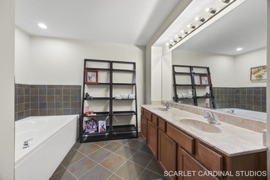 Well-maintained 7th-floor unit featuring two spacious bedrooms on Seven Bridges Golf Club in Illinois - for sale on GolfHomes.com, golf home, golf lot