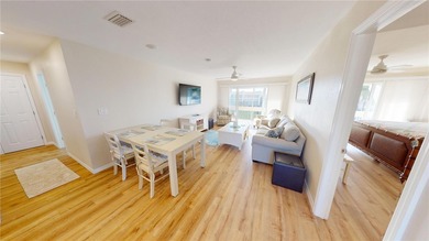 Light, bright, and UPDATED! Fantastic Punta Gorda Isles location on Saint Andrews South Golf Club in Florida - for sale on GolfHomes.com, golf home, golf lot