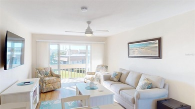 Light, bright, and UPDATED! Fantastic Punta Gorda Isles location on Saint Andrews South Golf Club in Florida - for sale on GolfHomes.com, golf home, golf lot