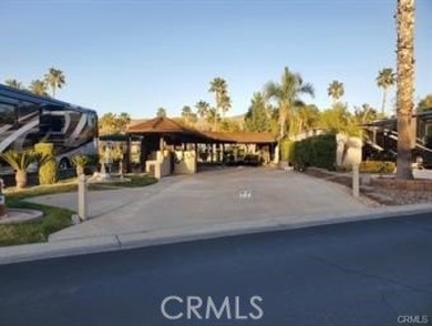 Island Escape Build-Out. Huge Shade for Entertaining with lots on Rancho California RV Resort in California - for sale on GolfHomes.com, golf home, golf lot