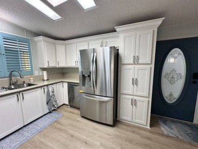 Located on a prime corner lot directly across from the clubhouse on Four Lakes Golf Club in Florida - for sale on GolfHomes.com, golf home, golf lot
