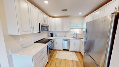 Light, bright, and UPDATED! Fantastic Punta Gorda Isles location on Saint Andrews South Golf Club in Florida - for sale on GolfHomes.com, golf home, golf lot