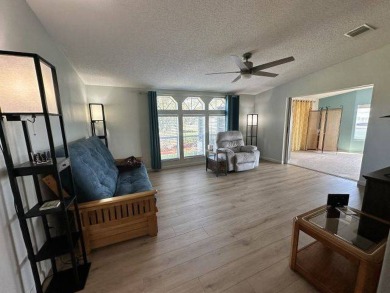 Located on a prime corner lot directly across from the clubhouse on Four Lakes Golf Club in Florida - for sale on GolfHomes.com, golf home, golf lot
