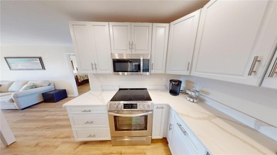 Light, bright, and UPDATED! Fantastic Punta Gorda Isles location on Saint Andrews South Golf Club in Florida - for sale on GolfHomes.com, golf home, golf lot