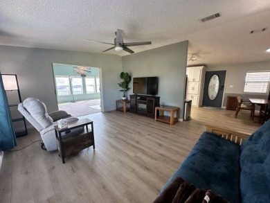 Located on a prime corner lot directly across from the clubhouse on Four Lakes Golf Club in Florida - for sale on GolfHomes.com, golf home, golf lot