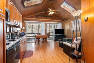 A charming cabin in the woods, move in ready, with 2 bedrooms, 1 on Hide-A-Way Hills Golf Club in Ohio - for sale on GolfHomes.com, golf home, golf lot