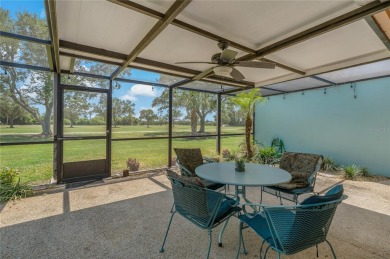 This villa has the BEST Lanai  because it's located half way on Seminole Lake Country Club in Florida - for sale on GolfHomes.com, golf home, golf lot