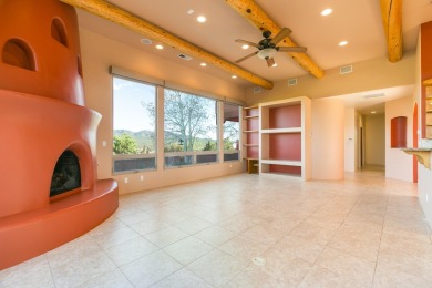Set on a hillside in the desirable Paa-Ko, this custom-built on Paa-Ko Ridge Golf Club  in New Mexico - for sale on GolfHomes.com, golf home, golf lot