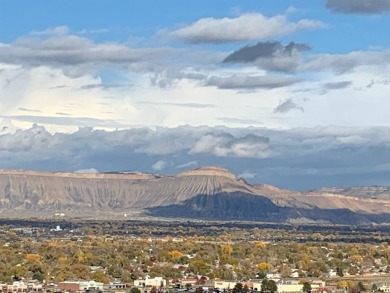 SPECTACULAR view lot on which to build your dream home in on The Golf Club At Redlands Mesa in Colorado - for sale on GolfHomes.com, golf home, golf lot