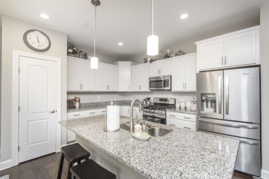 This expansive townhome offers luxurious living with 3 bedrooms on Pete Dye River Course of Virginia Tech in Virginia - for sale on GolfHomes.com, golf home, golf lot