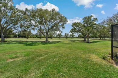 This villa has the BEST Lanai  because it's located half way on Seminole Lake Country Club in Florida - for sale on GolfHomes.com, golf home, golf lot