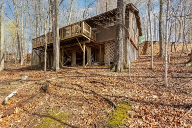 A charming cabin in the woods, move in ready, with 2 bedrooms, 1 on Hide-A-Way Hills Golf Club in Ohio - for sale on GolfHomes.com, golf home, golf lot