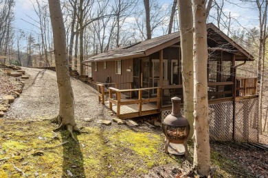 A charming cabin in the woods, move in ready, with 2 bedrooms, 1 on Hide-A-Way Hills Golf Club in Ohio - for sale on GolfHomes.com, golf home, golf lot