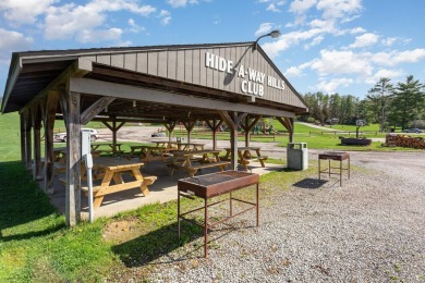 A charming cabin in the woods, move in ready, with 2 bedrooms, 1 on Hide-A-Way Hills Golf Club in Ohio - for sale on GolfHomes.com, golf home, golf lot