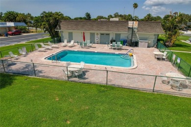 This villa has the BEST Lanai  because it's located half way on Seminole Lake Country Club in Florida - for sale on GolfHomes.com, golf home, golf lot