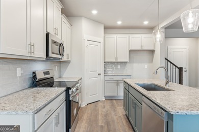 Beautiful Ranch-Style Home in the Tranquil Golf Course Community on Traditions of Braselton Golf Club in Georgia - for sale on GolfHomes.com, golf home, golf lot