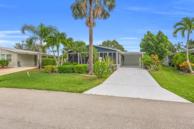 Experience the South Florida lifestyle in the Savannah Club on Savanna Golf Club in Florida - for sale on GolfHomes.com, golf home, golf lot