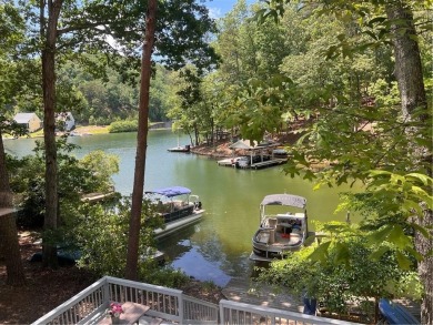 Gather around for large family meals overlooking gorgeous lake on The Highlands Course at Lake Arrowhead in Georgia - for sale on GolfHomes.com, golf home, golf lot