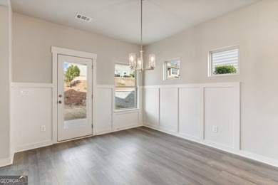 Beautiful Ranch-Style Home in the Tranquil Golf Course Community on Traditions of Braselton Golf Club in Georgia - for sale on GolfHomes.com, golf home, golf lot