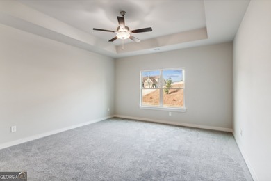 Beautiful Ranch-Style Home in the Tranquil Golf Course Community on Traditions of Braselton Golf Club in Georgia - for sale on GolfHomes.com, golf home, golf lot