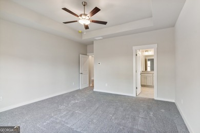 Beautiful Ranch-Style Home in the Tranquil Golf Course Community on Traditions of Braselton Golf Club in Georgia - for sale on GolfHomes.com, golf home, golf lot