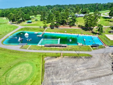 Step into a Southern storybook. Nestled beneath a canopy of on Jackson Links Golf Course in Alabama - for sale on GolfHomes.com, golf home, golf lot