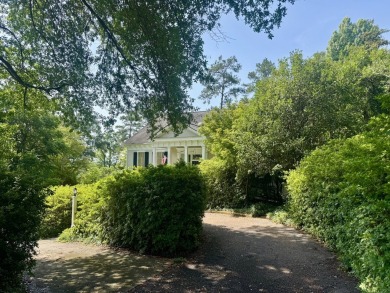 Step into a Southern storybook. Nestled beneath a canopy of on Jackson Links Golf Course in Alabama - for sale on GolfHomes.com, golf home, golf lot