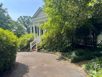 Step into a Southern storybook. Nestled beneath a canopy of on Jackson Links Golf Course in Alabama - for sale on GolfHomes.com, golf home, golf lot