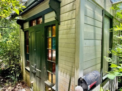 Step into a Southern storybook. Nestled beneath a canopy of on Jackson Links Golf Course in Alabama - for sale on GolfHomes.com, golf home, golf lot