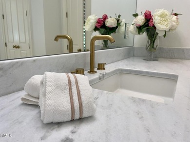 It's here, at the end of a quiet cul-de-sac, you immediately on TPC at Wakefield Plantation in North Carolina - for sale on GolfHomes.com, golf home, golf lot