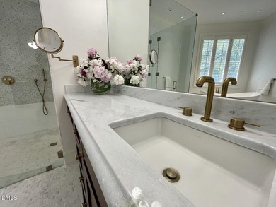 It's here, at the end of a quiet cul-de-sac, you immediately on TPC at Wakefield Plantation in North Carolina - for sale on GolfHomes.com, golf home, golf lot