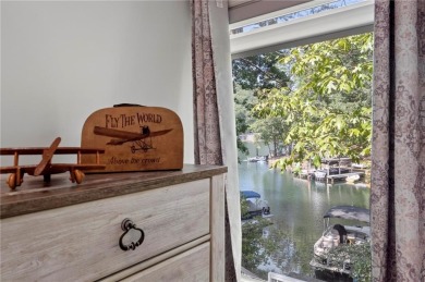 Gather around for large family meals overlooking gorgeous lake on The Highlands Course at Lake Arrowhead in Georgia - for sale on GolfHomes.com, golf home, golf lot