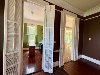 Step into a Southern storybook. Nestled beneath a canopy of on Jackson Links Golf Course in Alabama - for sale on GolfHomes.com, golf home, golf lot