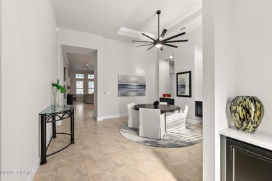 Nestled inside the guard gated, golf-cart-friendly community of on Plantation Bay Golf and Country Club in Florida - for sale on GolfHomes.com, golf home, golf lot