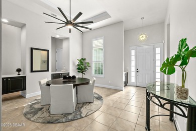 Nestled inside the guard gated, golf-cart-friendly community of on Plantation Bay Golf and Country Club in Florida - for sale on GolfHomes.com, golf home, golf lot